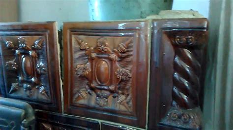 Régi cserépkályha bontása